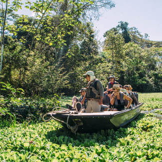 Tourists at the skiff on the excursion