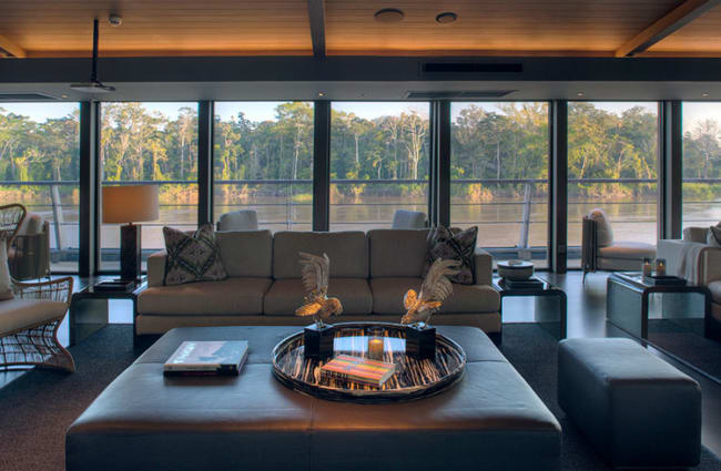 Sofa and coffee table with the Amazon river view