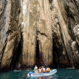 A small skiff with people
