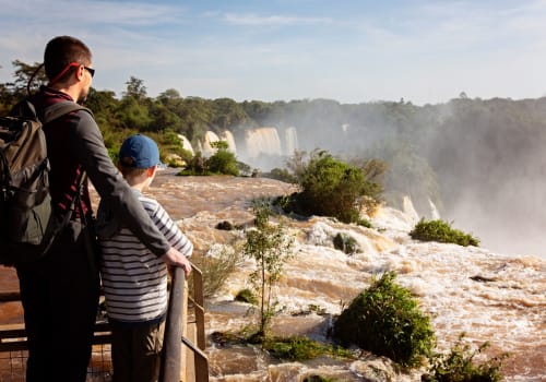 Family of 2: Father And Son Enjoying The Gorgeous View Of The Iguazu Falls